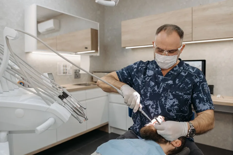 Dentist working in a dental clinic